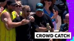 ‘He’s held onto the ball and his beer’ – watch one-handed crowd catch