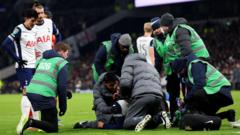 Tottenham’s Bentancur taken off on stretcher after injury against Liverpool